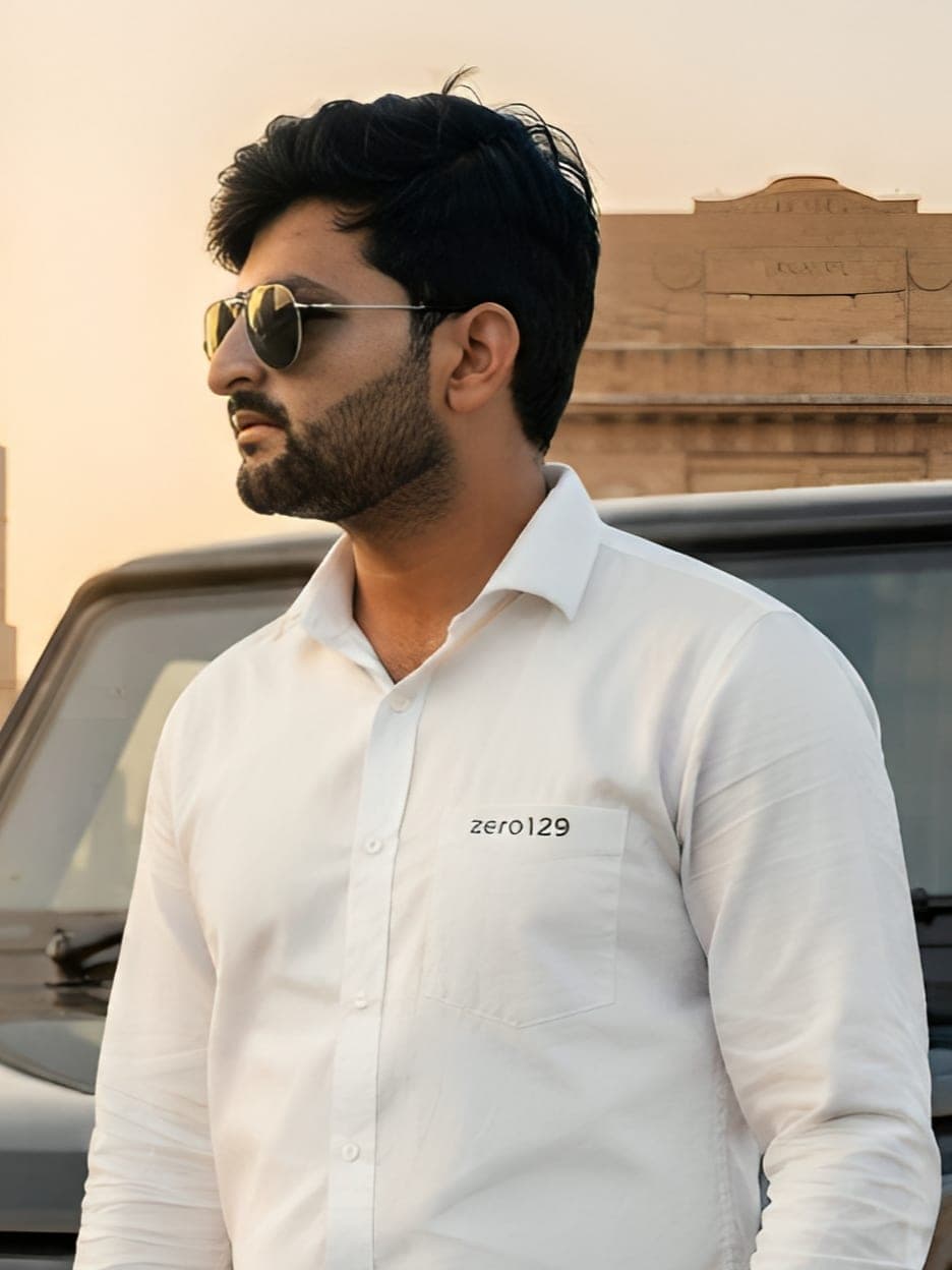 Shikhar Khurana in the white Zero129 Signature Shirt at golden hour